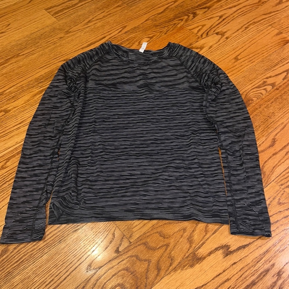 Athleta Woman’s Black Striped Long Sleeve Size L
